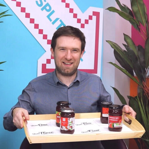 Greg Smuk holding a tray of jams