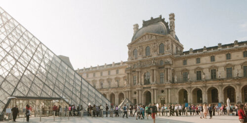 An image of the Louvre, a large glass pyramid