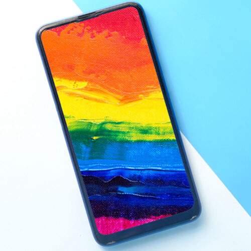 A phone screen showing a painted rainbow