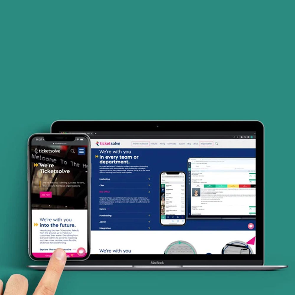 A laptop screen and a phone screen showing the Ticketsolve pages