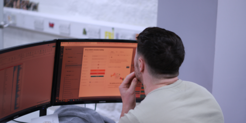 Ash working on a computer