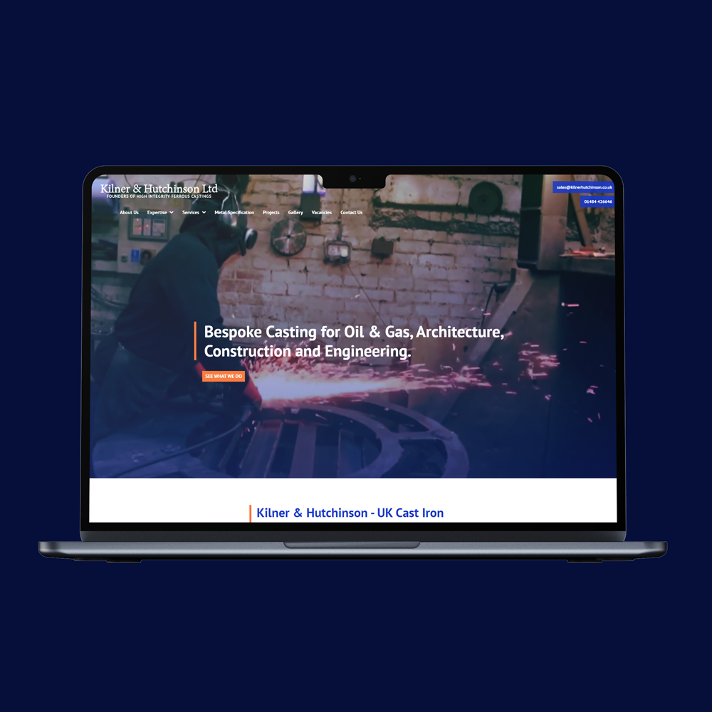 Kilner and Hutchinson bespoke web design page shown on a laptop