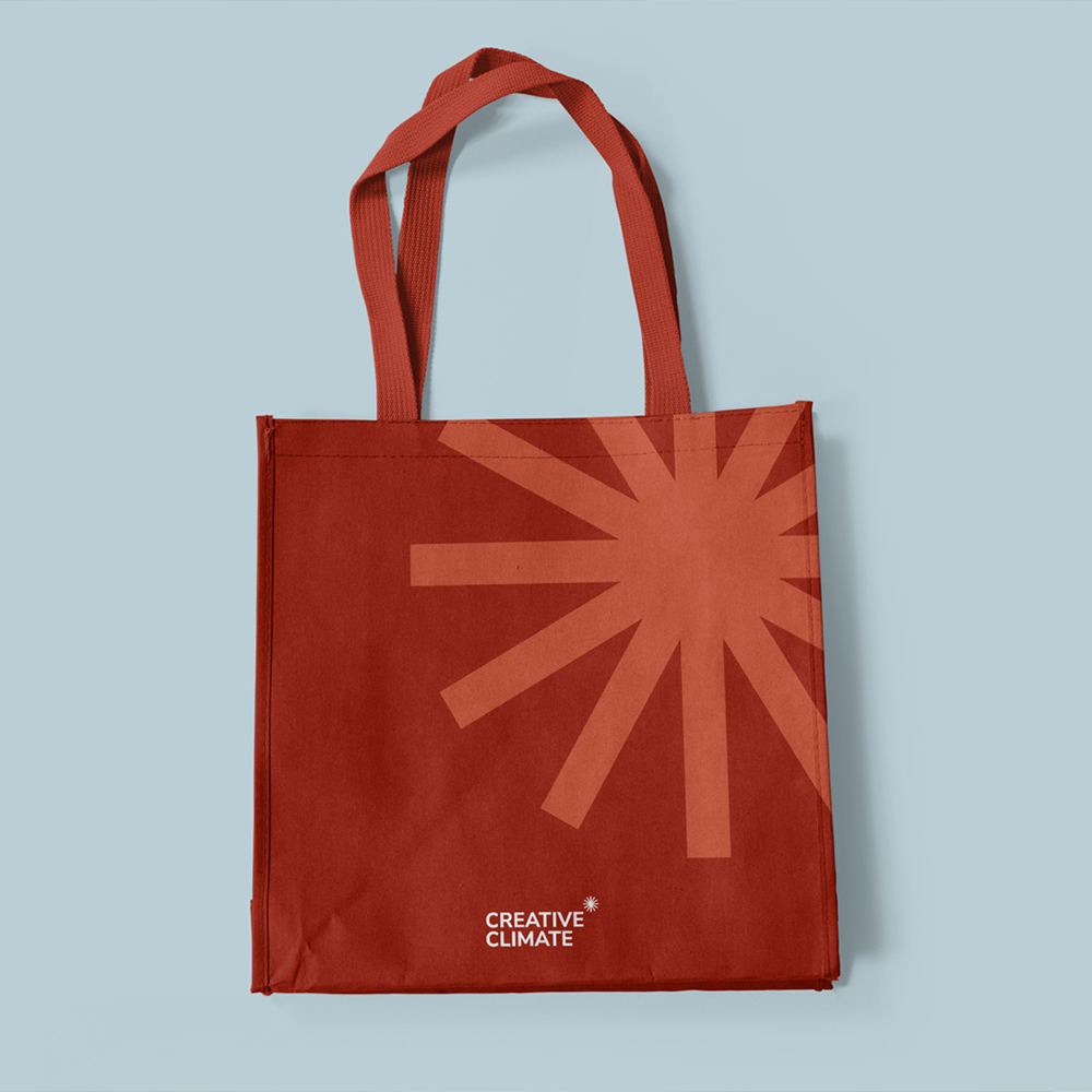 Creative climate red tote bag with their logo and branding