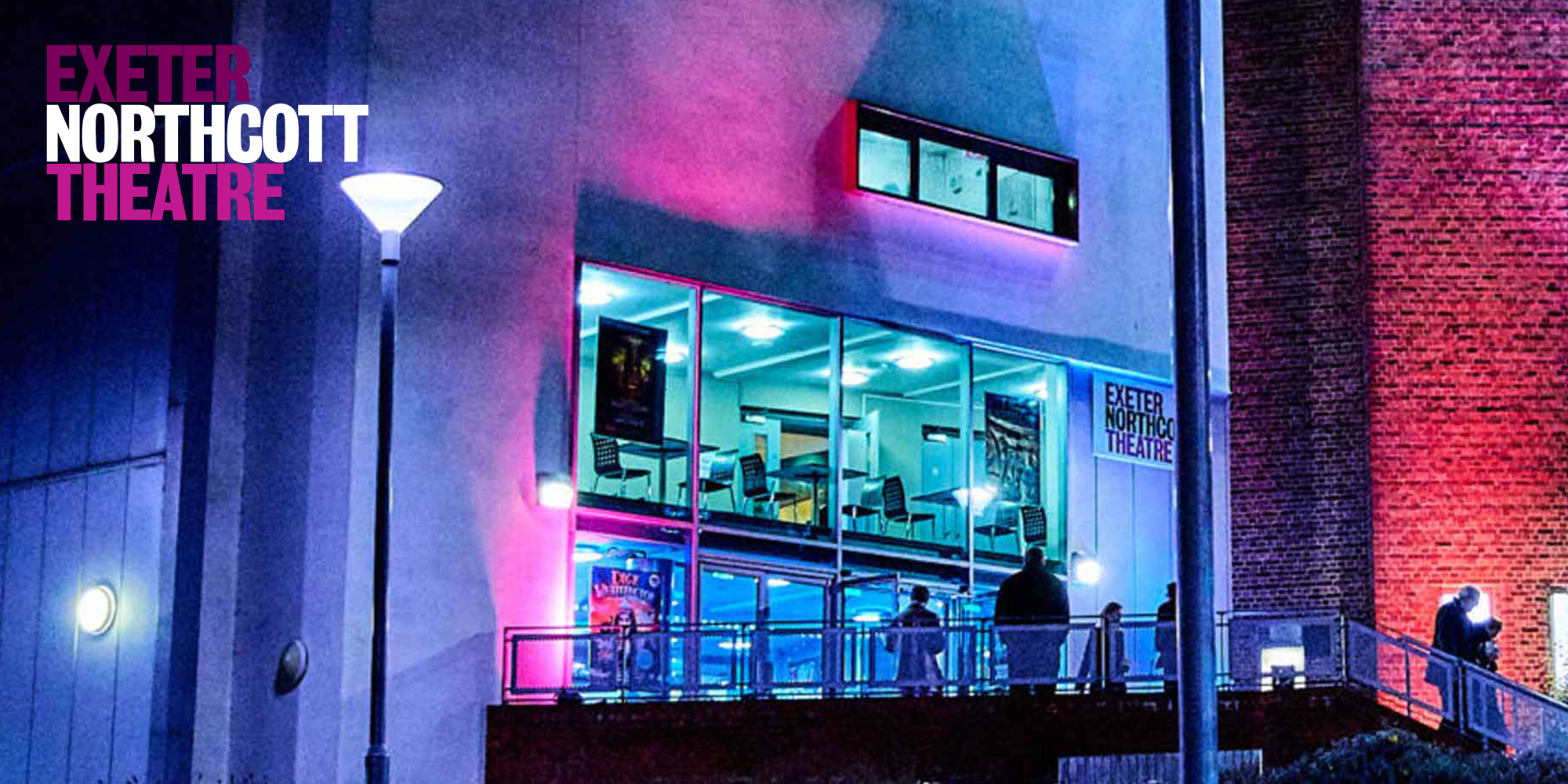 Exeter Northcott Theatre building lit up at night