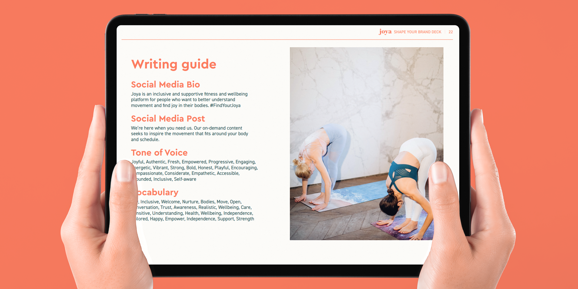 An Ipad showing the Writing Guide for Joya, with an image of two people doing yoga poses