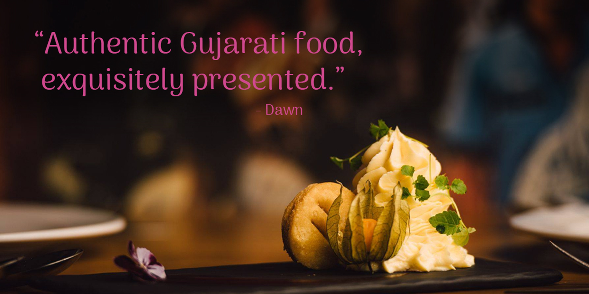 A plate of food with the text 'Authentic Gujarati food, exquisitely presented.' above it