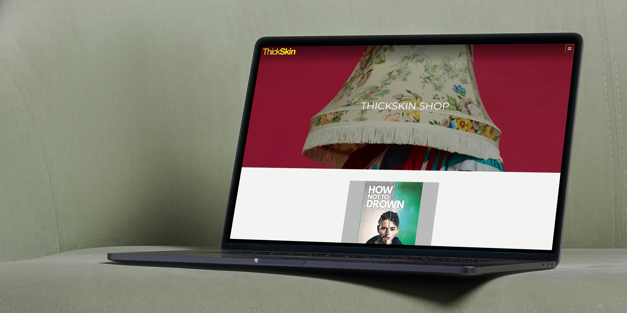 ThickSkin shop page shown on a laptop