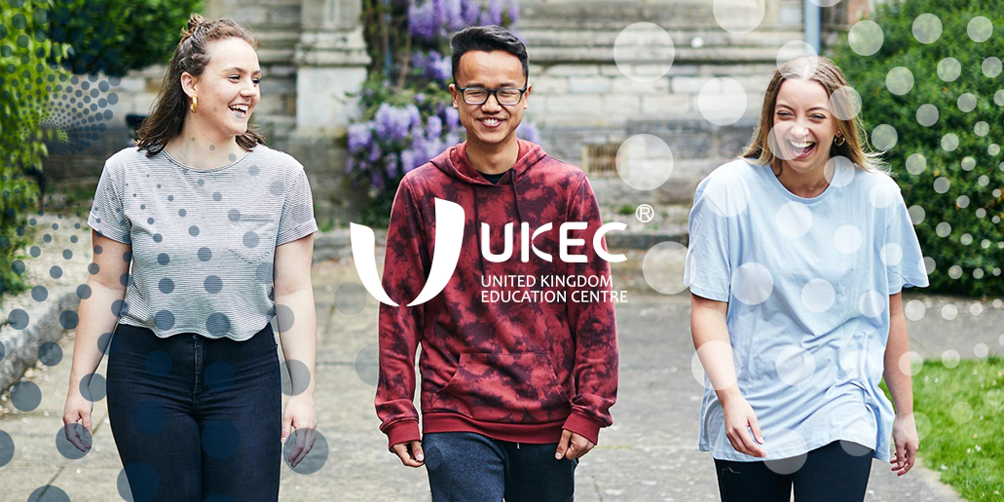 Young people smiling with the UKEC