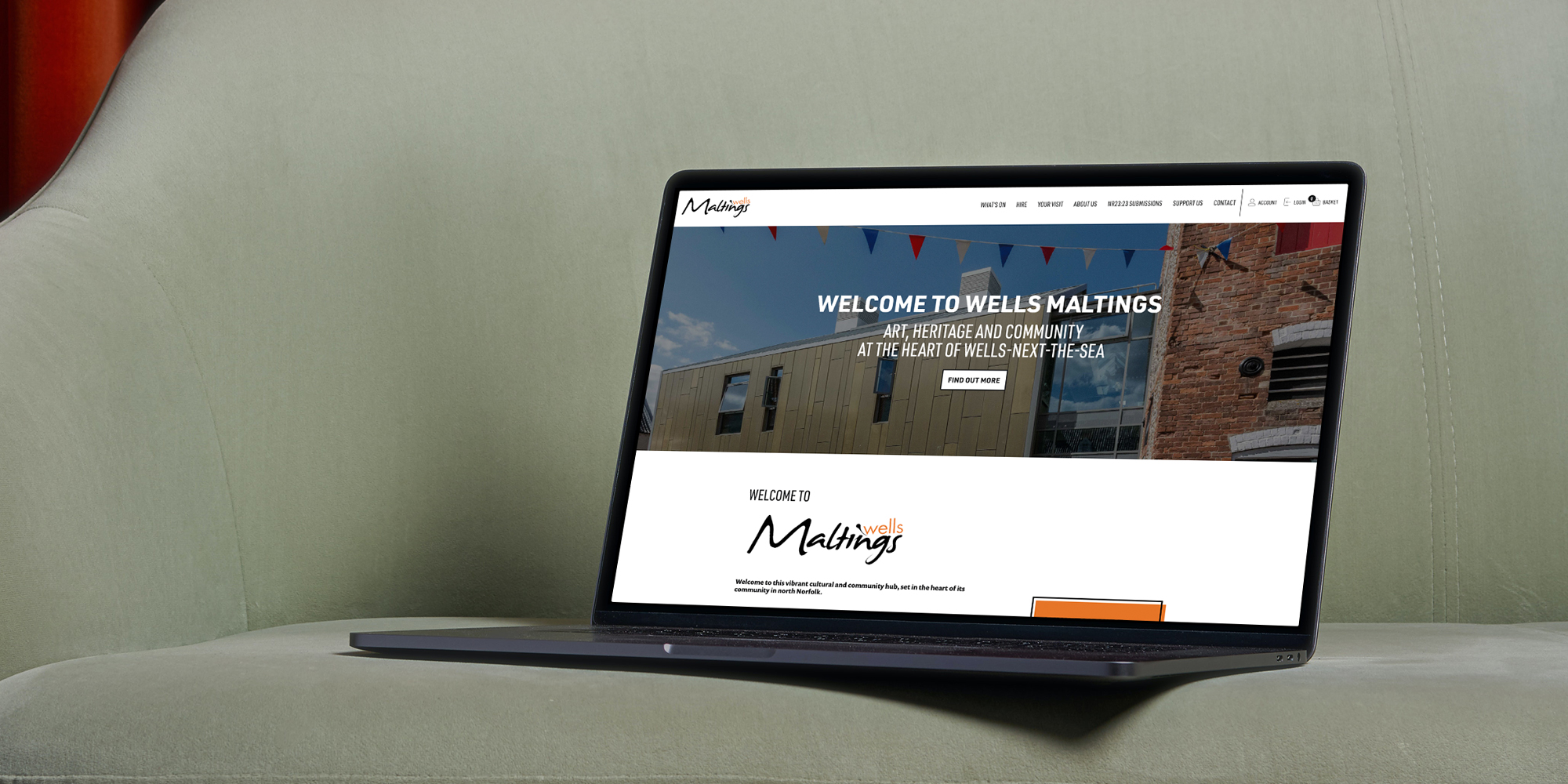 Wells Maltings welcome page shown on a laptop screen