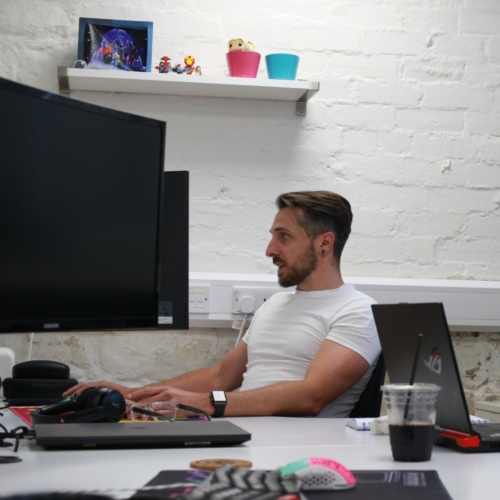 Jon working on a computer