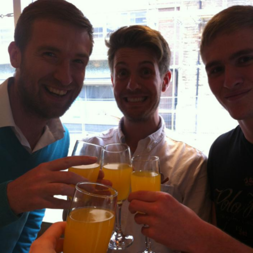 Three Splitpixel employees from 2009 drinking mimosas