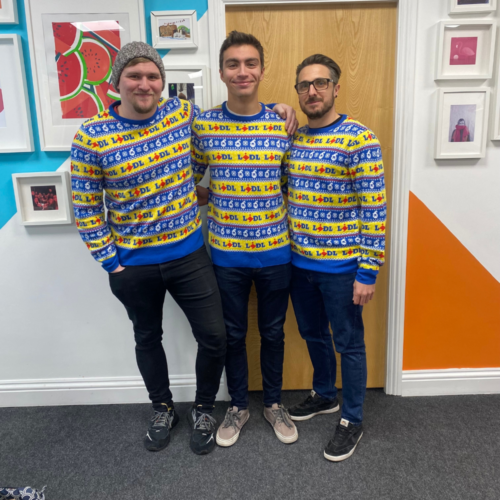 Ash, Max and Jon wearing Lidl Christmas jumpers